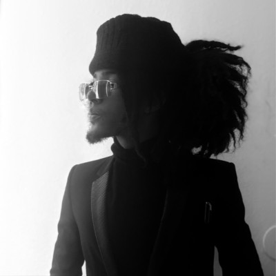 André Charles, known as 6xrpse, in a black and white profile portrait